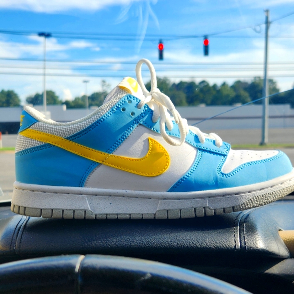 Nike Kids White, Blue, and Yellow Sneakers